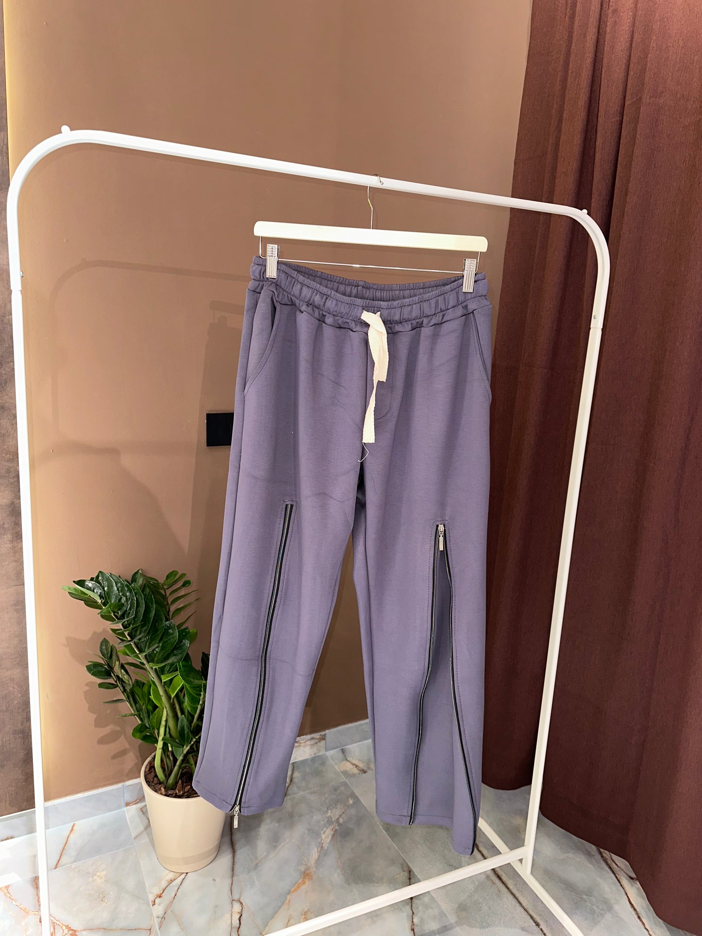 PANT CON ZIP PIOMBO